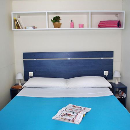Happy Camp mobile homes in Camping Villaggio Internazionale San Menaio Esterno foto