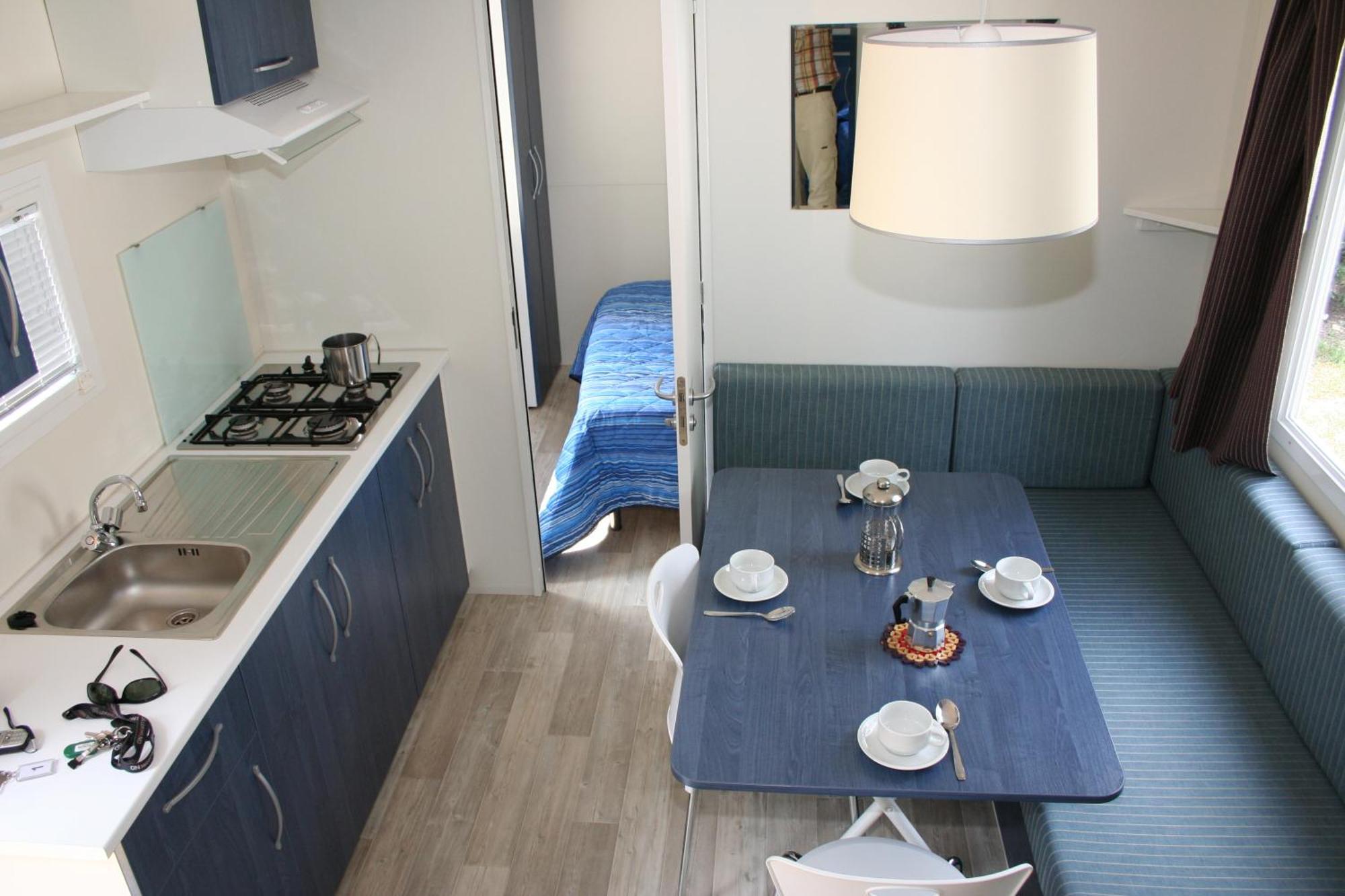 Happy Camp mobile homes in Camping Villaggio Internazionale San Menaio Esterno foto